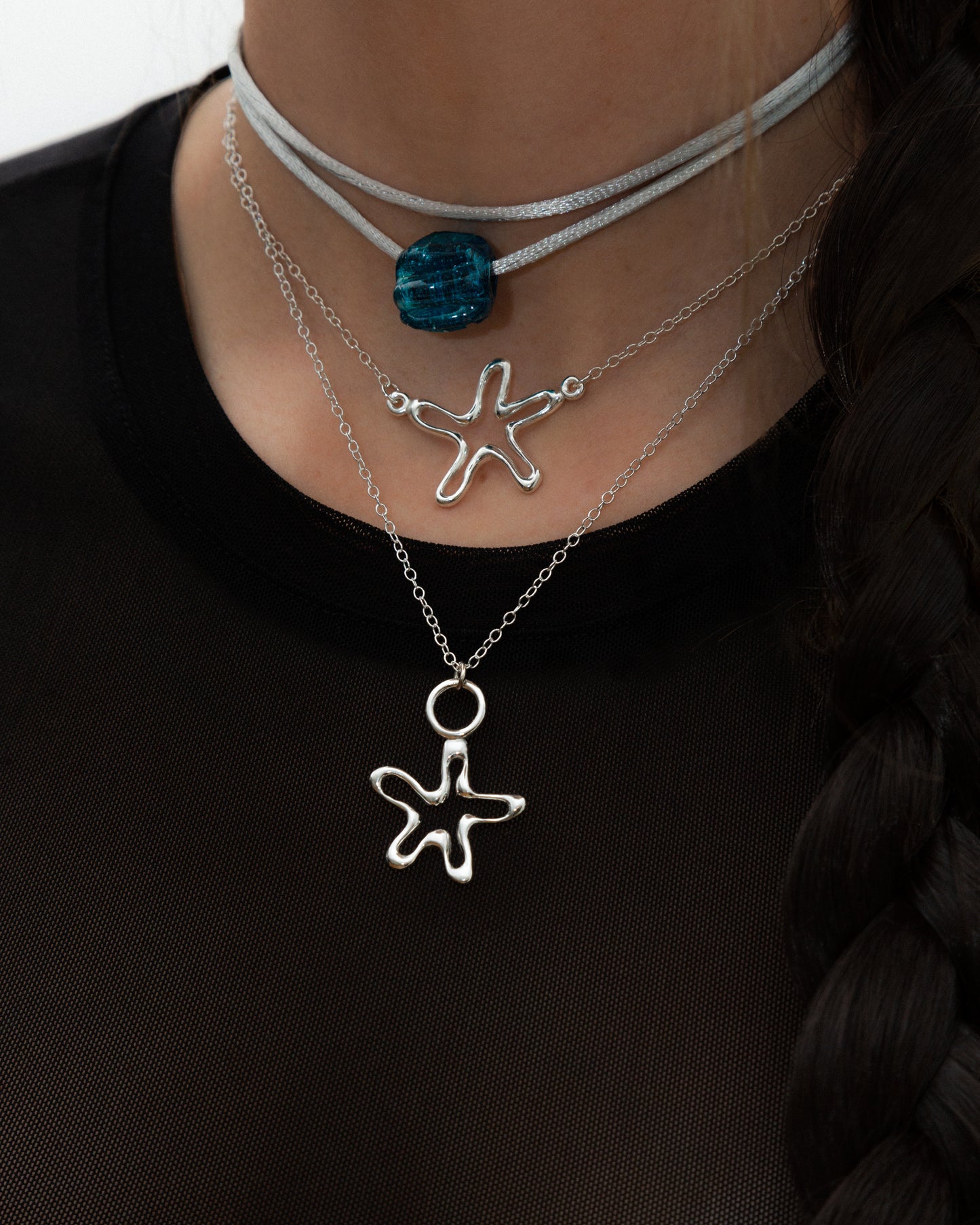 Aqua blue jelly with grey cord